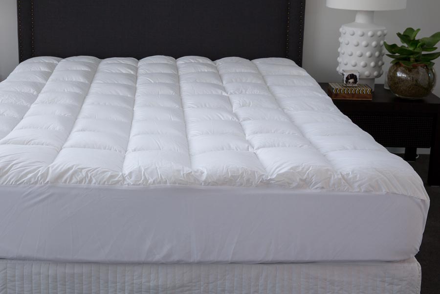 fitted sheet over mattress topper